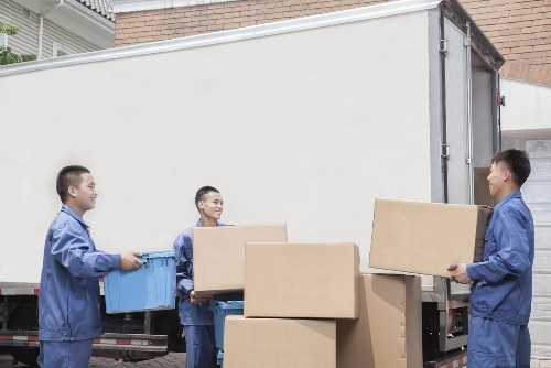 Flat removals team planning a move in Swisscottage apartment block