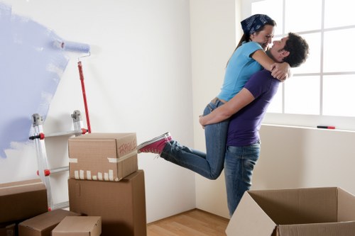 Removal van and moving boxes ready for a local move in Swiss Cottage