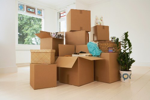 Fragile household items packed for a move in Swisscottage