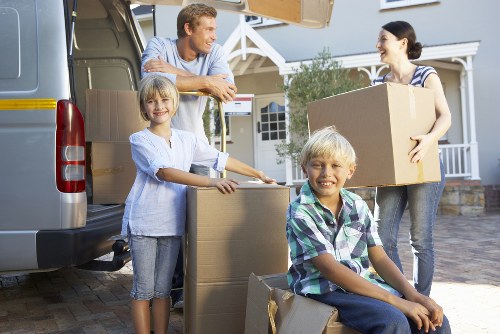 Packed boxes and furniture prepared for temporary storage