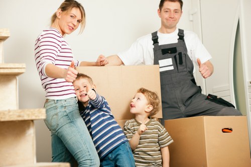 Careful loading of furniture for a local flat move in Swisscottage